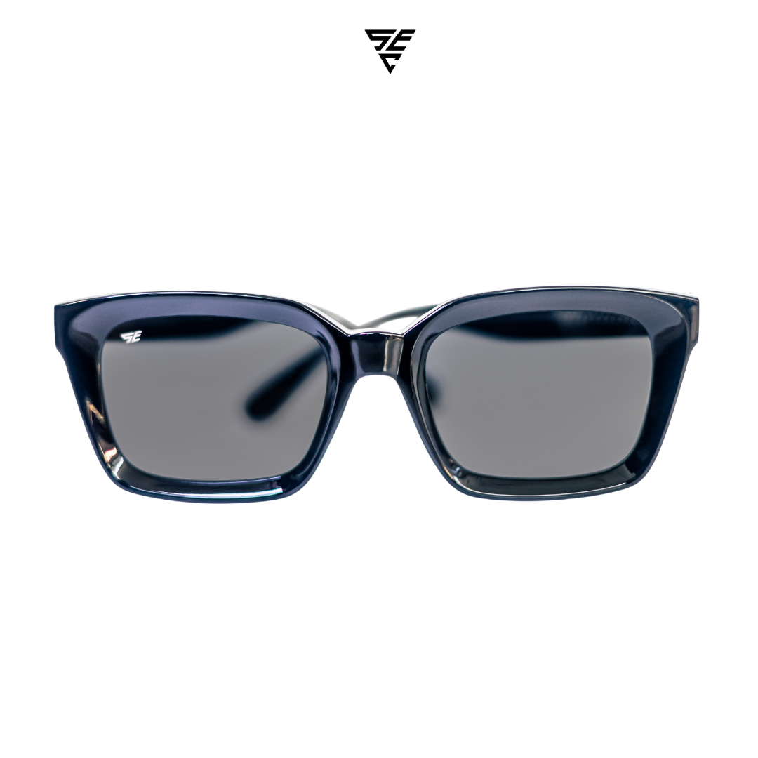 Embodying a classic unisex style, these all-black rectangular block sunglasses offer a timeless elegance that effortlessly exudes sophistication. The silver metal accent discreetly placed inside the arms adds a touch of refinement, unveiling a hidden world of opulence. A perfect blend of exclusivity and grace, these sunglasses offer the perfect accessory to give off an expensive and elegant look. 